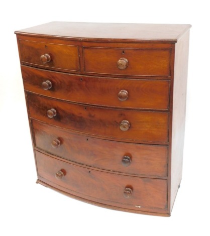 A 19thC mahogany bow front chest, of two short and four long drawers, lacking feet, 122cm high, 105cm wide, 53cm deep.