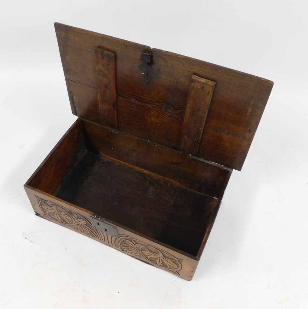 A late 17thC/early 18thC oak bible box, with fan and floral carving ...