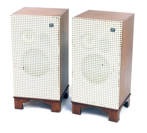 A pair of teak cased Wharfedale speakers, 63cm high.