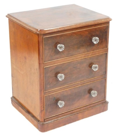 A Victorian mahogany commode, converted with crystal handles on a plinth, 66cm high, 52cm wide, 43cm deep.