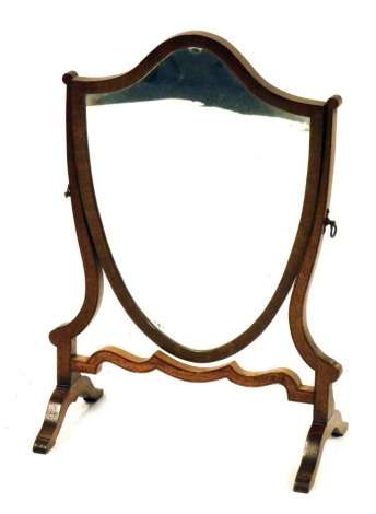 A mahogany shield frame dressing table mirror, 55cm high.