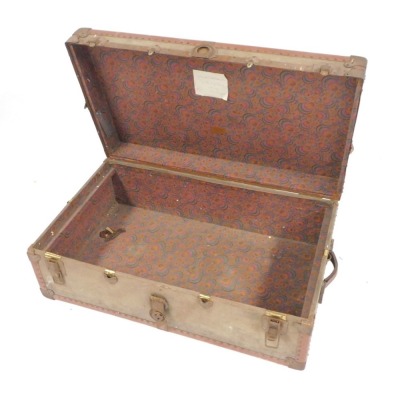 A canvas bound and metal lined trunk, bearing initials J W M C D, 32cm high, 91cm wide, 52cm deep. - 2