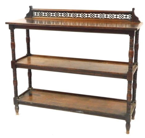 A 19thC mahogany three tier buffet, with a moulded back, on turned supports, 105cm high, 122cm wide, 39cm deep.