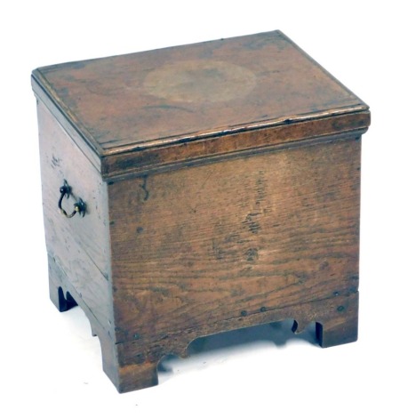 A 20thC oak coal box, with single hinged lid and a metal lined interior, with brass swing handles, 41cm high, 42cm wide, 38cm deep.