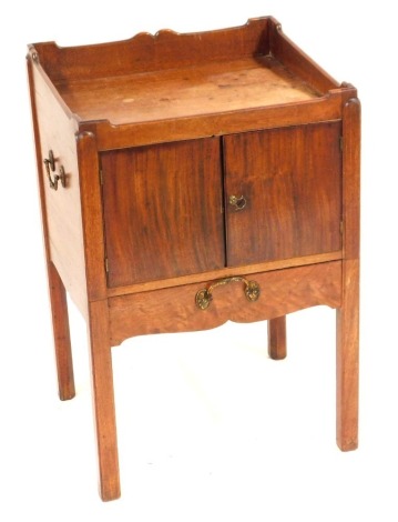 A 19thC mahogany washstand, on a raised gallery top, single door, on taper legs, 81cm high, 53cm wide, 46cm deep.