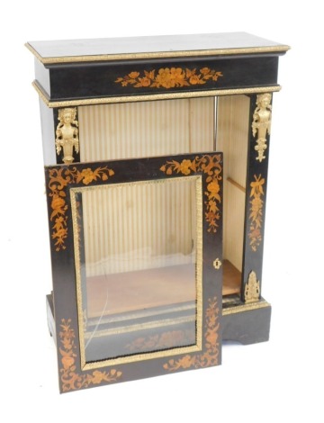 A Victorian ebonised and floral marquetry pier cabinet, with gilt mounts with a single glazed door, on plinth, 111cm high, 80cm wide, 34cm deep. (AF)