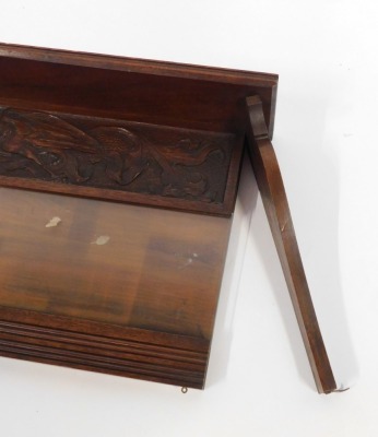 A carved walnut wall shelf, the applied shell top with panel, and glazed back, 34cm high, 72cm wide. - 2