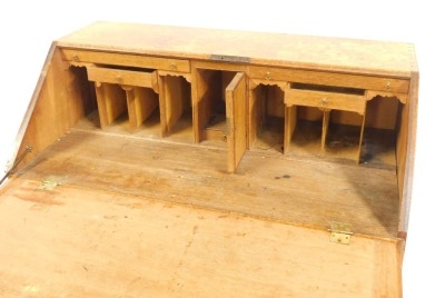 A 19thC oak bureau, the fall flap above arrangement of four drawers, with brass swing handles, on bracket feet, 105cm high, 95cm wide, 50cm deep. - 2