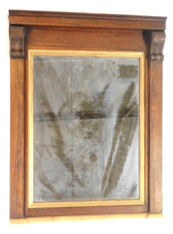 A 19thC rosewood rectangular wall mirror, with column supports, later painted with gilt decoration, 82cm high, 63cm wide, 10cm deep.