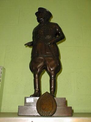 A carved mahogany figure of Earl Haig carved by G W Burbidge