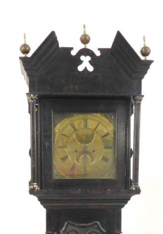 George Womersley. A Georgian and later oak longcase clock, square brass dial with rococo scroll spandrels, moon face and date aperture, chapter ring bearing Roman and Arabic numerals, the hood with broken pediment, surmounted by brass and copper ball fini