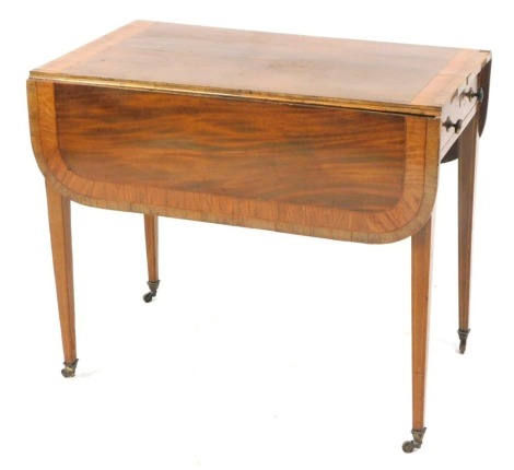 A 19thC Pembroke table, the rectangular top with two fall flap, with single drawer, on reeded taper legs, with parquetry inlay, terminating in castors, 72cm high, 48cm wide, 85cm deep.