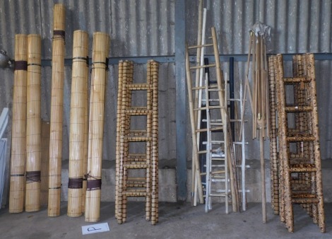 By Tender. A group of bamboo blinds, various sizes, a teak garden parasol frame (AF - lacking fabric cover), and bamboo ladders, various designs and sizes. (a quantity) Note: VAT is payable on the hammer price of this lot at 20% in addition to Buyer's Pr