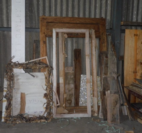 By Tender. Various driftwood, teak pieces, reclamation timber including frames for windows and doors, also a large driftwood frame and glass, together with table parts and spares. (a quantity) Note: VAT is payable on the hammer price of this lot at 20% in