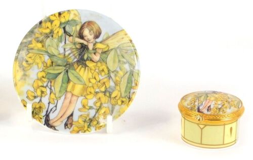 A Royal Worcester Connoisseurs collection pill box, with fairy, 5cm diameter, and a matching Laburnum fairy pin dish, 9cm diameter. (2)