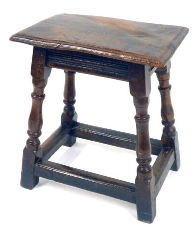 A late 18thC oak joint stool, with rectangular top, on rectangular base, 52cm high, the top 29cm x 46cm.