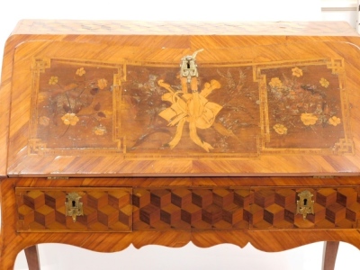 A 19thC French tulipwood, rosewood and marquetry bureau, the serpentine fall boxwood inlaid with flowers and musical instruments, revealing a fitted interior of serpentine drawers and pigeon holes with a deep well and leather writing section, with two dra - 3