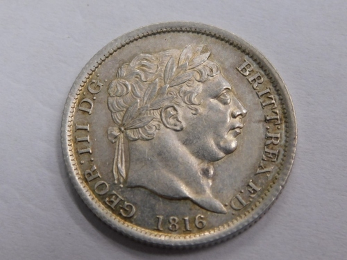 A George III silver shilling, 1816.