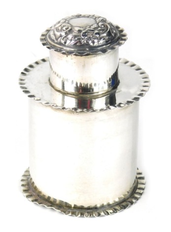 An Edward VII silver jar and cover, of cylindrical form with part repousse decorated lid and plain body, Birmingham 1903. 3.3oz