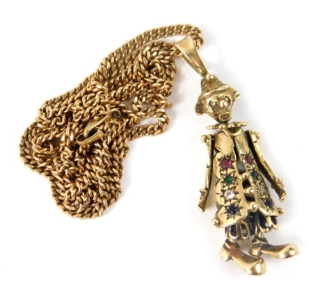 A 9ct gold clown pendant and chain, the articulated clown set with garnet, emerald, diamond and sapphire, the pendant 6cm high, on a curb link chain, 16.4g all in.