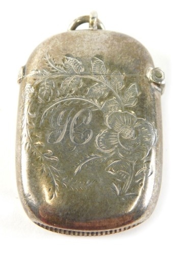 A Victorian silver gilt vesta case, bright cut with flowers, with ring top, Chester 1895, 6cm high, 0.7oz.