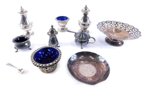 A silver plated dish, centred by a Maria Theresa Thaler style coin, 10cm diameter, various silver plate items, cruet items, Mappin and Webb pierced dish, etc. (a quantity)