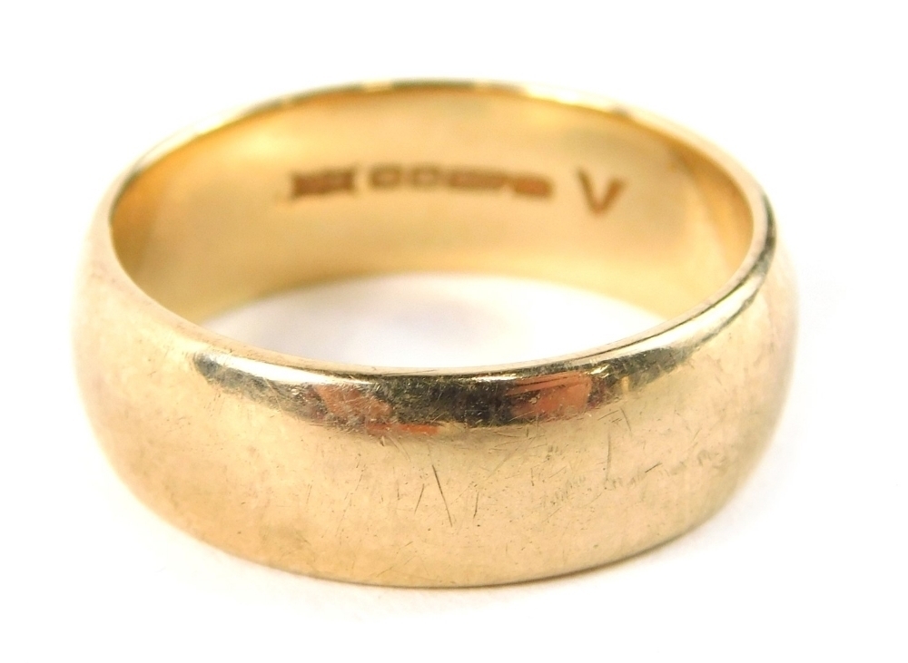 A 9ct gold wedding band of plain design maker s stamp HS ring