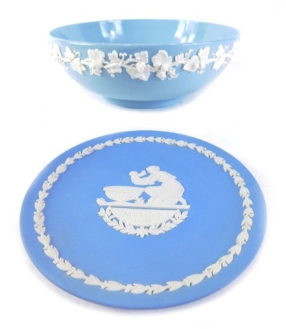 A Wedgwood blue Jasperware bowl, a Mother 1973 saucer, 16cm diameter, and a green Jasperware plate raised with classical figures.