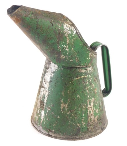 A 20thC oil can with fixed spout and handle, in green, label rubbed, 57cm high.