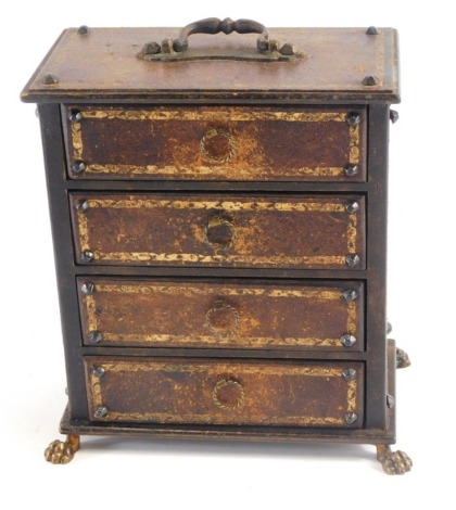 A miniature jewellery type chest, of four long drawers on hairy paw feet, with swing handle, 20cm high x 19cm wide x 12cm deep.