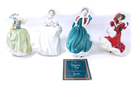 Various Royal Doulton figures, Royal Doulton Classics Christmas Day 2001, HN4315, with certificate, 23cm high, Jessica, Buttercup and Pretty Ladies Petite Christmas Day 2010, printed marks beneath. (4)