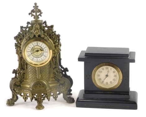 An elaborate metal mantel clock, with 5cm diameter Roman numeric dial and a further Architectural style mantel clock. (2)