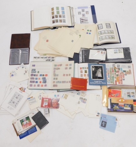 Various stamps, a comprehensive collection, first day covers, stamps, etc., a postcard album containing a quantity of stamped postcards, to include Second Election European Parliament 16p, a large quantity of others, various stamp albums containing a qua