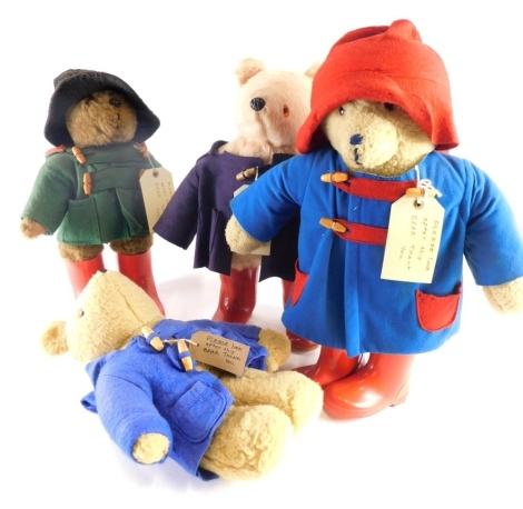 Various plush jointed Teddy Bears, Paddington type in blue duffel coat and red Dunlop Wellington boots, plush jointed 43cm high, two further Paddington bears and another. (a quantity)