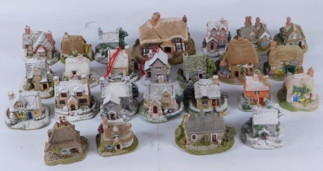 A group of Christmas Lilliput Lane Cottages, comprising Chestnut Cottage, Robin Cottage, The Gingerbread Shop, Holly Tree House, Dial Cottage, Mistletoe Cottage, Lazy Days, Jasmine Cottage, Fir Tree Cottage, Cranberry Cottage, Patterdale Cottage, Circular