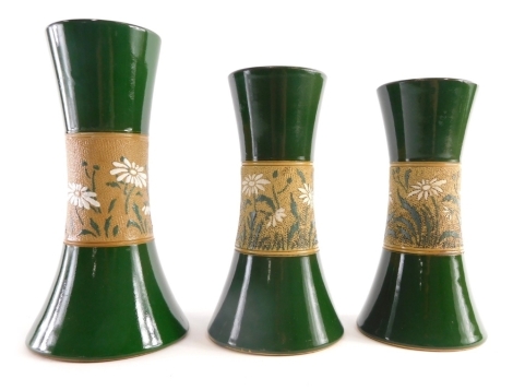 Three graduated Langley pottery stoneware vases, in green with a floral banding, unmarked, 22cm high etc. (3)