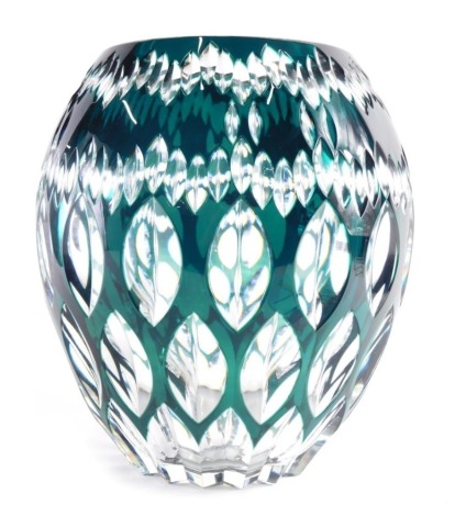 A Val St Lambert vase, in green and clear crystal with a repeat floral decoration, 29cm high.