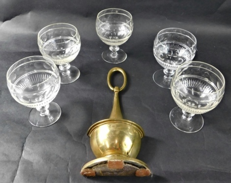 A set of five early 20thC crystal wine glasses, with bulbous bodies, circular and feather decoration on inverted stems and circular feet, and a brass footman in the form of vase 28cm high (a quantity)