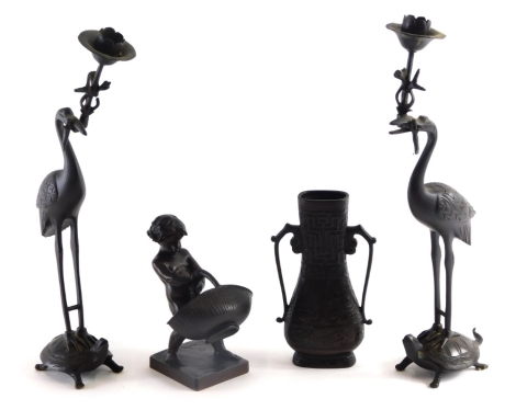 After Barrias (1841-1905) a bronze figure of a child holding basket, bearing signature and Barbedienne foundry mark, 16cm high. two spelter Japanese figures of storks, and a two handled oriental vase. (a quantity)