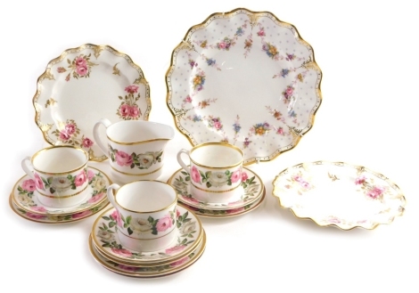 A Royal Worcester Royal Garden part tea service, to include three cups, saucers and plates and milk jug, and a further Royal Crown Derby Royal Pinxton Roses plate and side plate 31cm wide set.