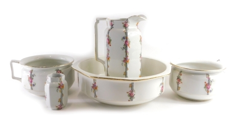 An early 20thC Burgess & Lee Burleighware pottery wash set, comprising jug, 35cm high, bowl, two chamber pots and tooth brush holder, each decorated with flowers and lines on a white ground, printed marks beneath. (a quantity)