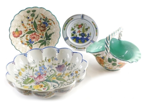 Various tin glazed earthenware, a 20thC basket with fixed handle 23cm wide, a Maiolica flared dish, various other tin glazed dish, various other tin glazed earthenware etc. (a quantity)
