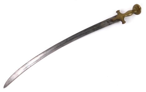 An Indian Talwar sword, with curved blade, brass handle and compressed pommel, 89cm long.
