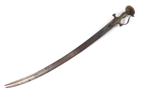 An Indian Talwar sword, with curved two sectional blade and gold inlaid handle, elaborately decorated with a compressed pommel, 94cm long.