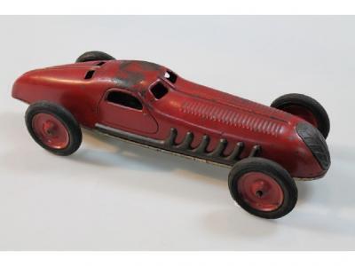 An early 20thC JEP French tin plate wind up racing car painted in dark red