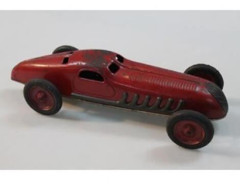 An early 20thC JEP French tin plate wind up racing car painted in dark red