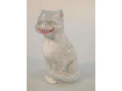 A Royal Worcester Cheshire cat designed by Freda Doughty