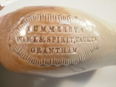 Grantham Interest. A 19thC stoneware beer bottle with applied maker's stamp - 2