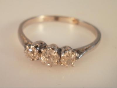 A three stone diamond ring