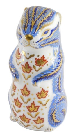 A Royal Crown Derby paperweight ornament otter, printed marks beneath, gilt stopper, 12cm high.